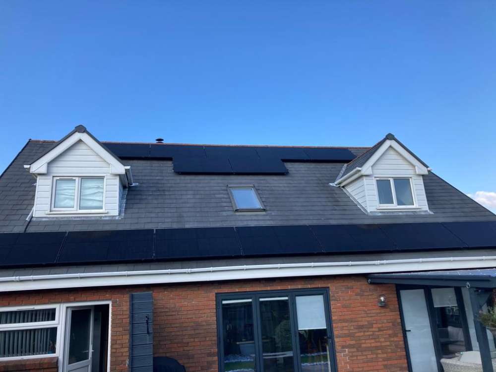 house with solar panels Upper Tumble, Llanelli, Carmarthenshire, Wales