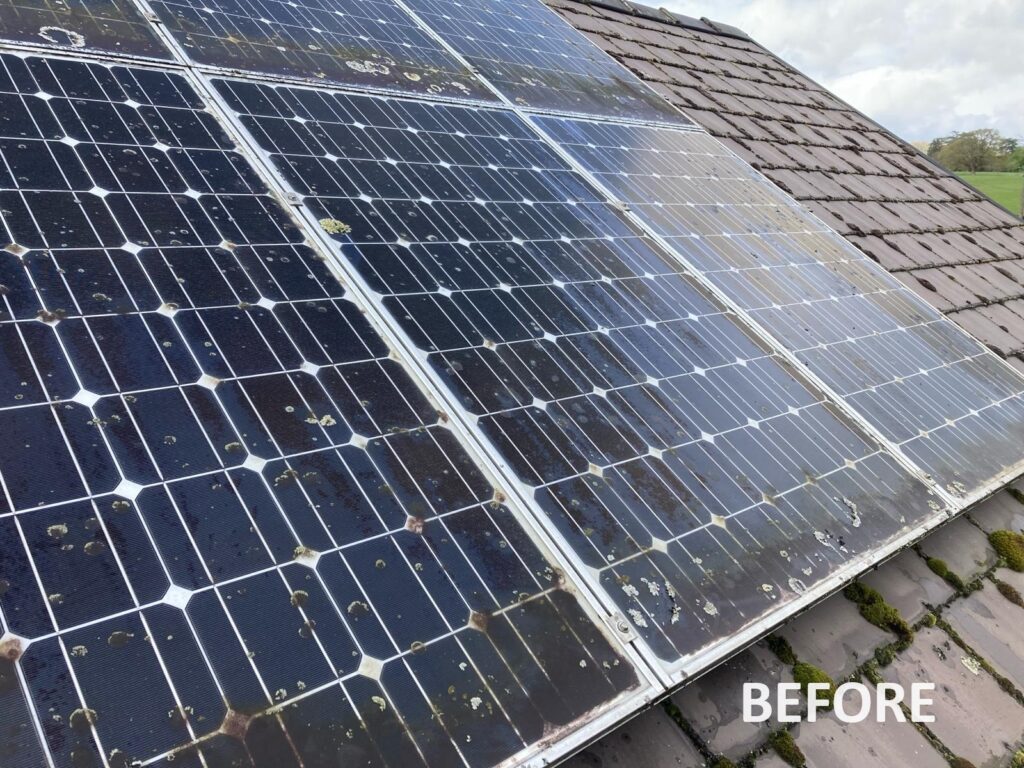 Dirty solar panels before cleaning on a domestic roof in Carmarthenshire