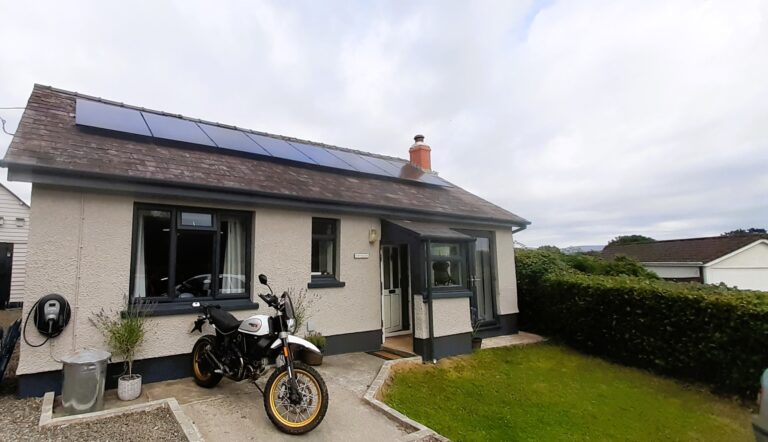 Residential solar panel installation on a UK home requiring DNO approval.